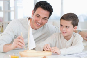picture shows a father practising good parenting